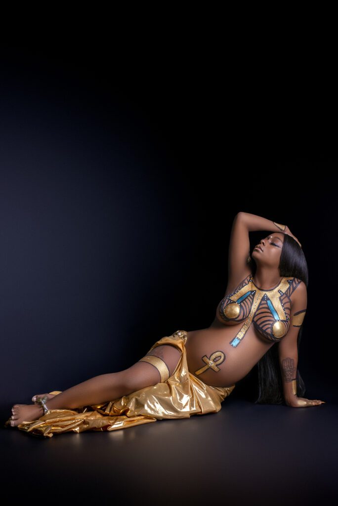 Cleopatra pose with body paint for Egyptian inspired maternity Session 