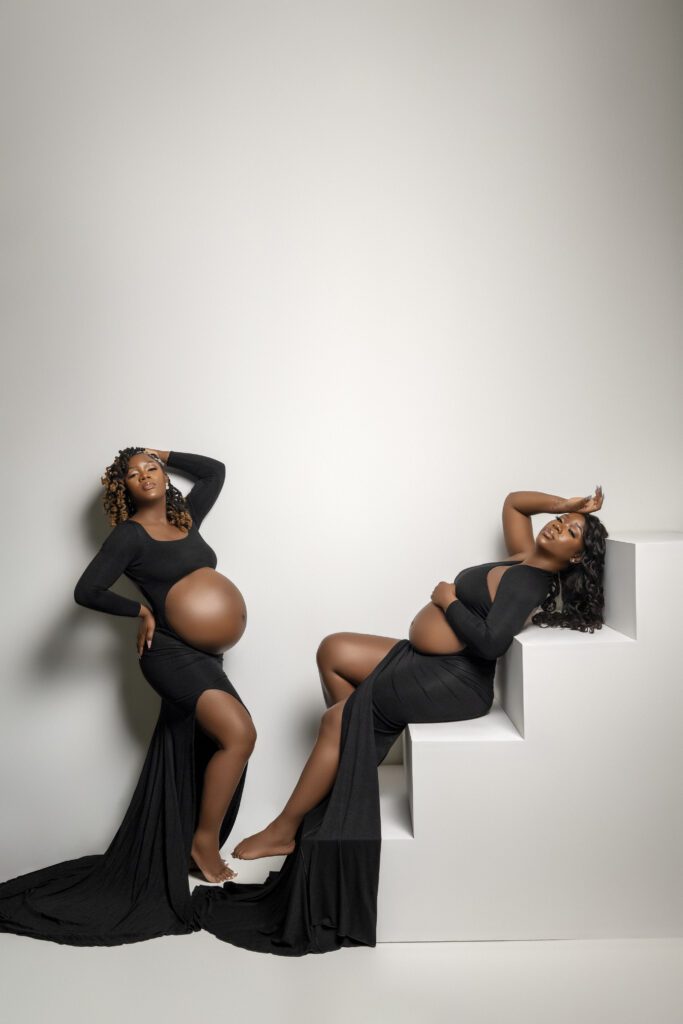 twin sisters posing for their maternity session 